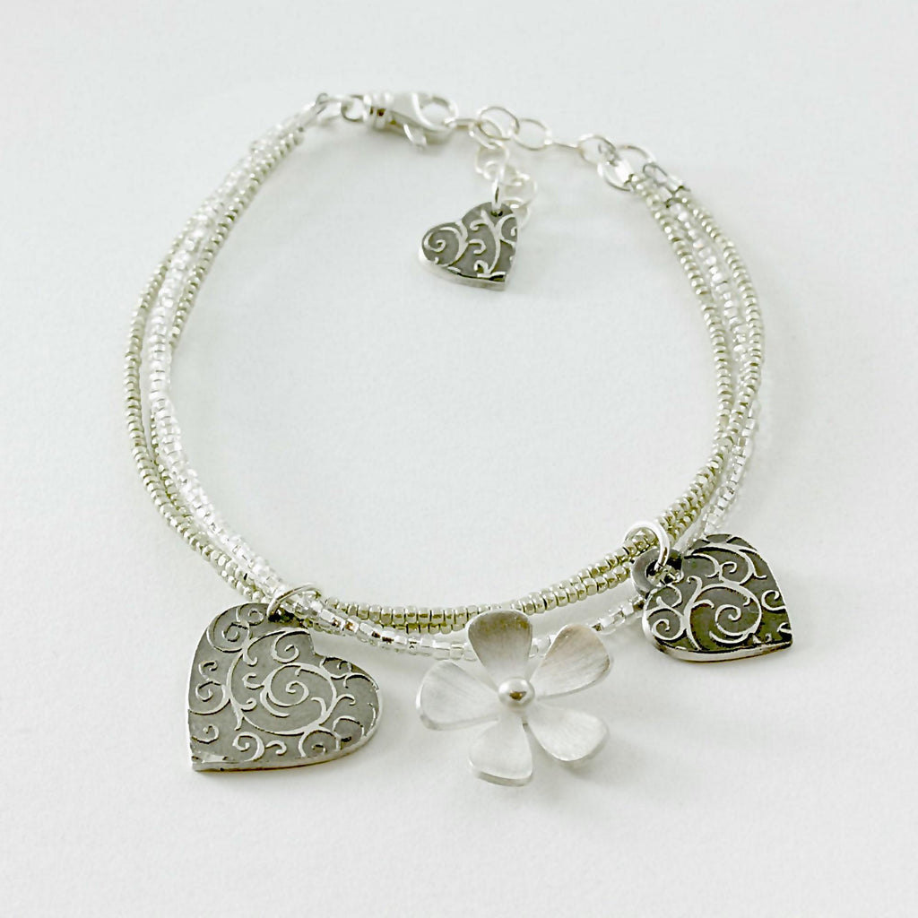 Three Hearts and a Flower Bracelet