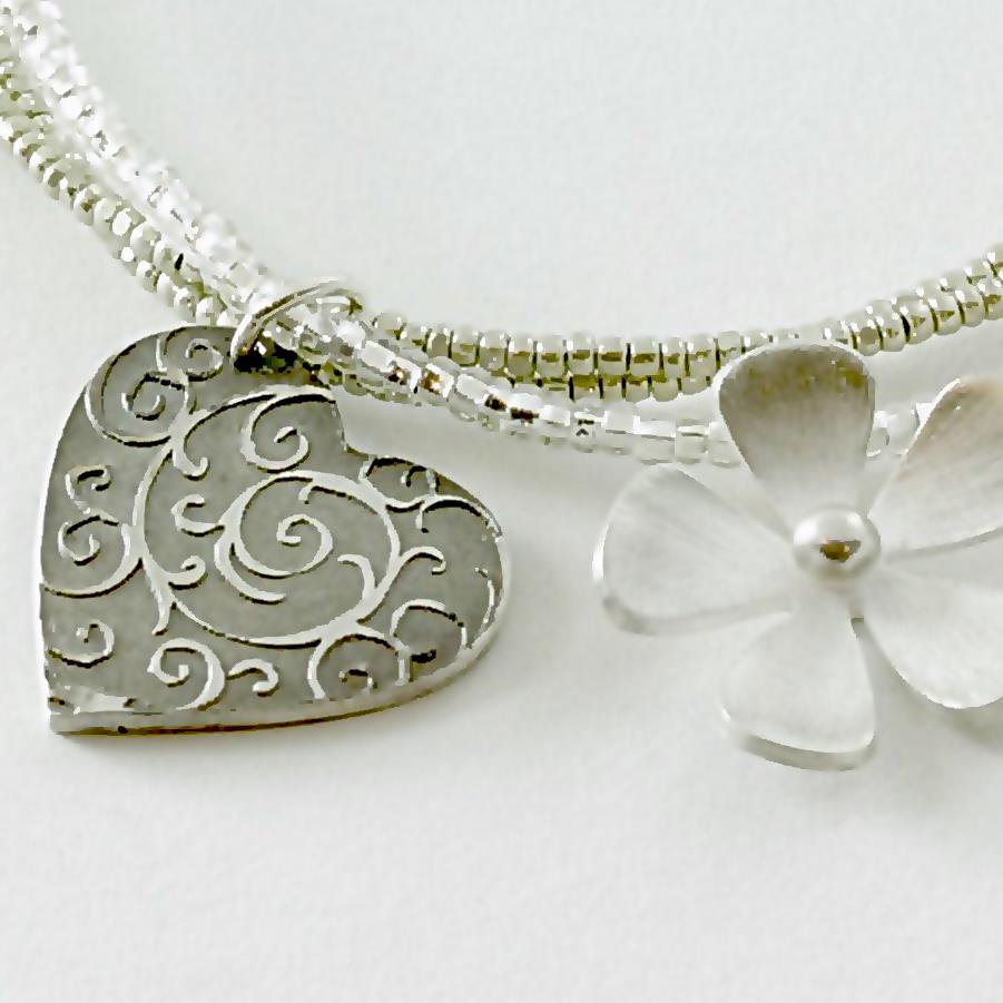 Three Hearts and a Flower Bracelet